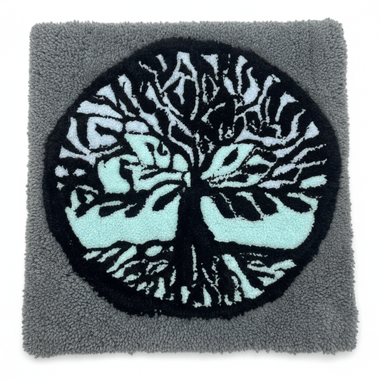 Tree of Life tufted rug flat lay product photo on white background